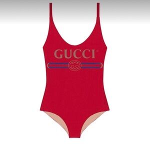 Gucci one piece swimsuit. Size XS but fits stretchy enough for S-M